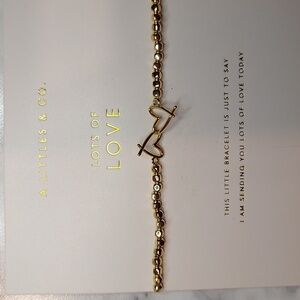 A Littles & Co lots of love gold tone heart bracelet